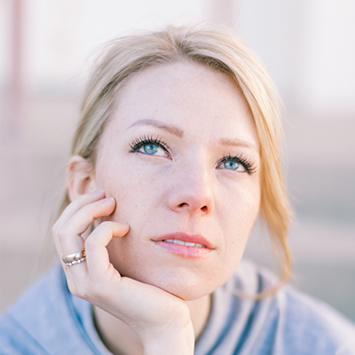 Woman deciding what she would like done at Chose N Elegance Day Spa